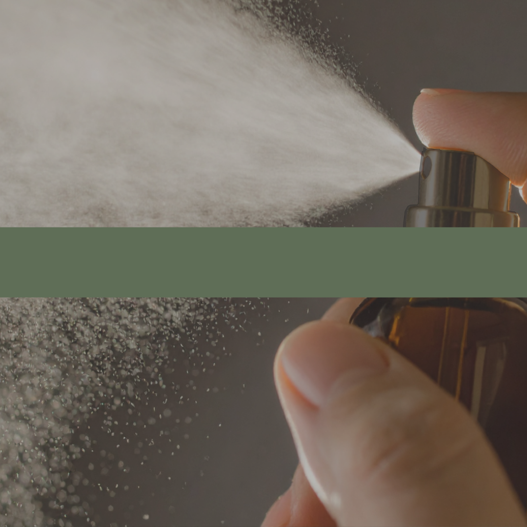 Hand holding a spray bottle with a close-up of the spray action on a neutral background